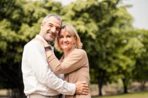 Senior couple together in park